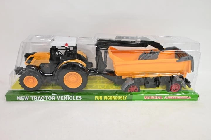Tracteur avec remorque et grappin de chargement