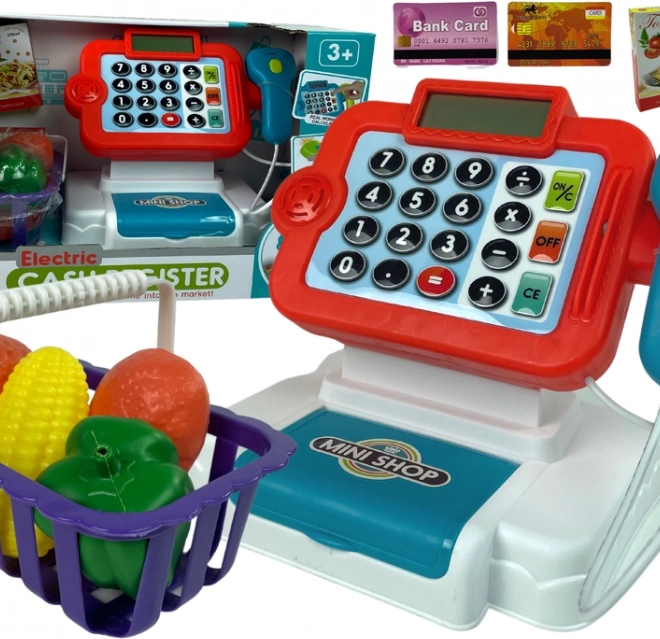 Kinderspeelkassa met rekenmachine en groentemand