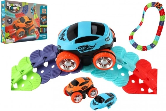 Racing track for kids with changeable pieces and a luminous car