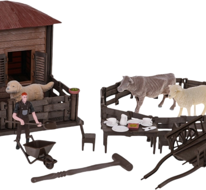 Bauernhof mit Traktor und Zubehör
