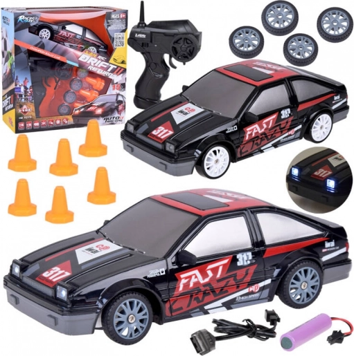 RC drift car with cones and spare wheels 1:24