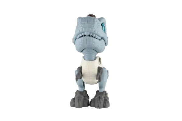 Dinosaurus schroeven plastic 12cm met schroevendraaier op batterijen met licht en geluid in doos 15x16x7cm