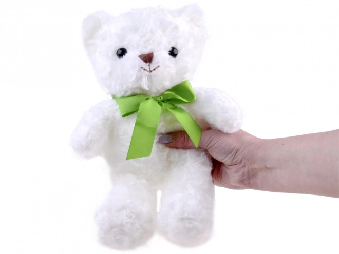 Ourson en peluche blanc avec ruban vert 30 cm