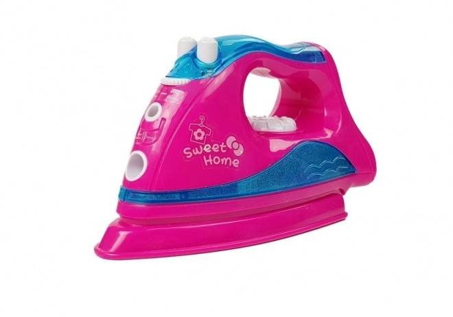 roze strijkset met strijkplank op kledinghangers