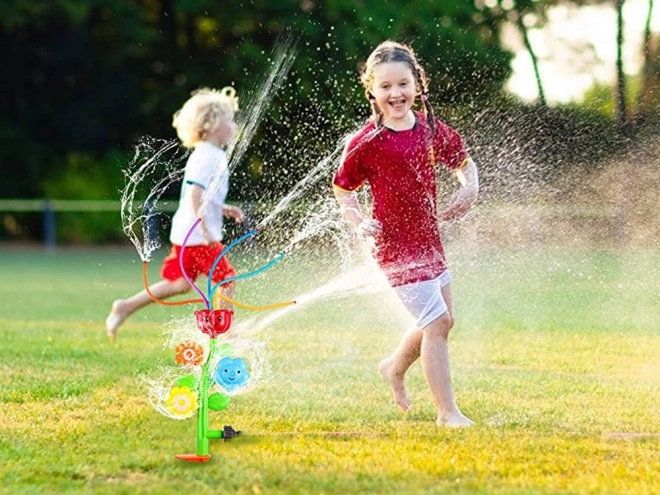 Fröhlicher Blumen-Kinderwasser-Sprinkler
