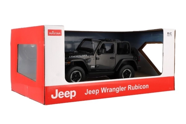 Auto RC Jeep Wrangler Rubicon zwarte plastic 29cm 2,4GHz op afstandsbed. op batterijen in doos 44x19x26cm