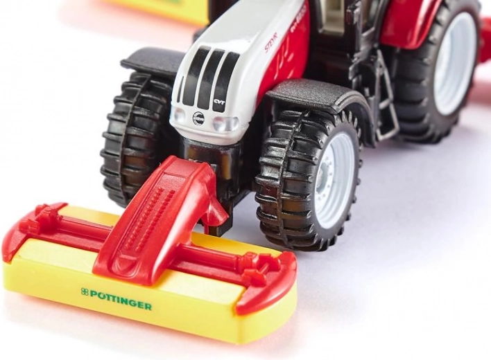 Detailed STEYR and PÖTTINGER branding