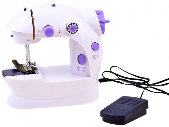 Machine à coudre mini avec pédale et table