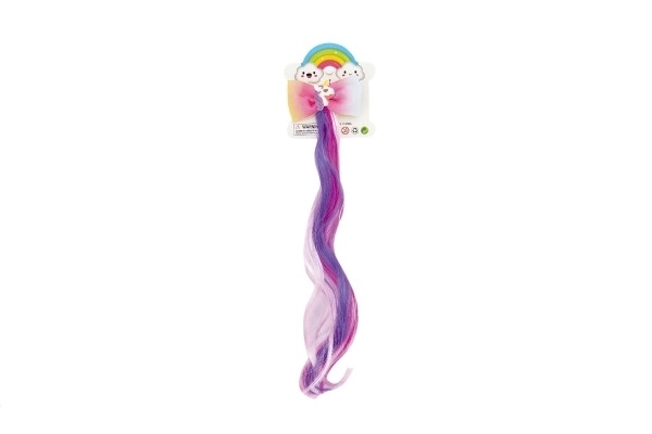 Haarclip met een regenboogkleurige eenhoorn charm
