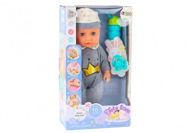 Interaktive Babypuppe im grauen Pyjama