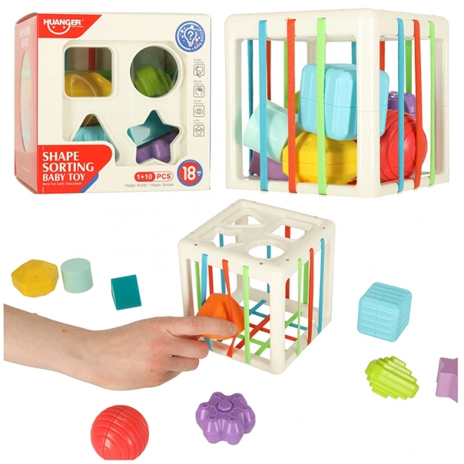 Flexibele sensorische kubus met vierkante puzzelblokken en vormensorteerder