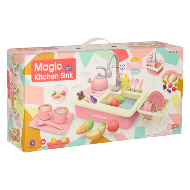 Kinderkeuken gootsteen met echt water en roze accessoires