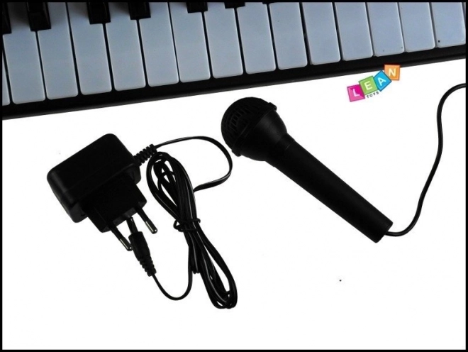 Electronische toetsen met microfoon
