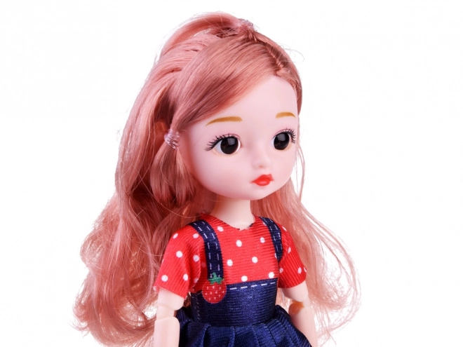 Prachtige pop met beweegbare ledematen en lang haar