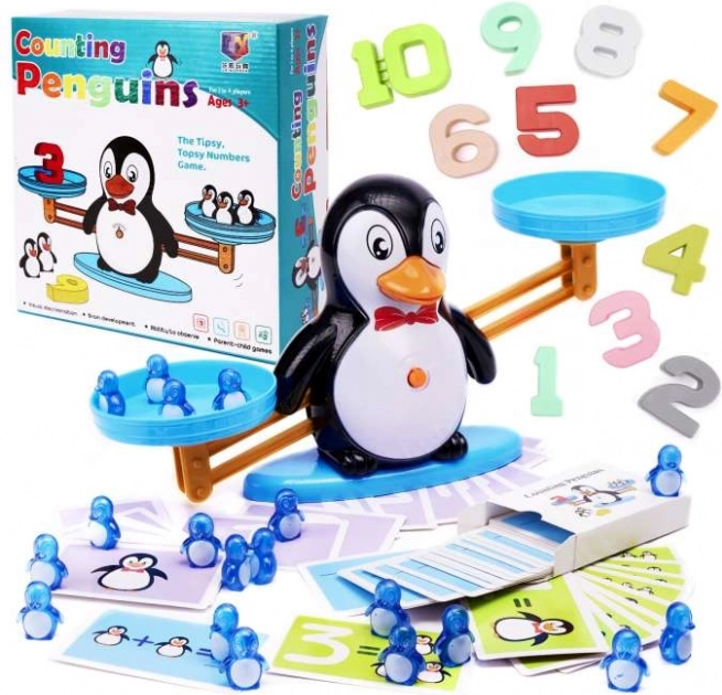 Balance à fléau avec petits animaux – Pingouin