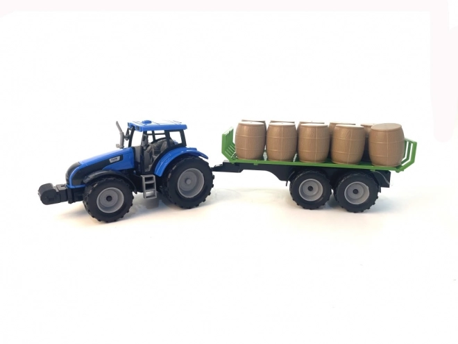 Traktor mit Schwungrad und Anhänger voller Heu