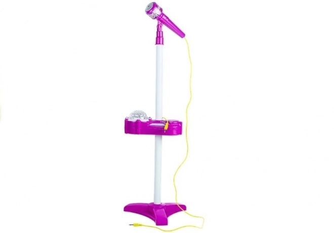 Roze set met microfoon, statief en projector