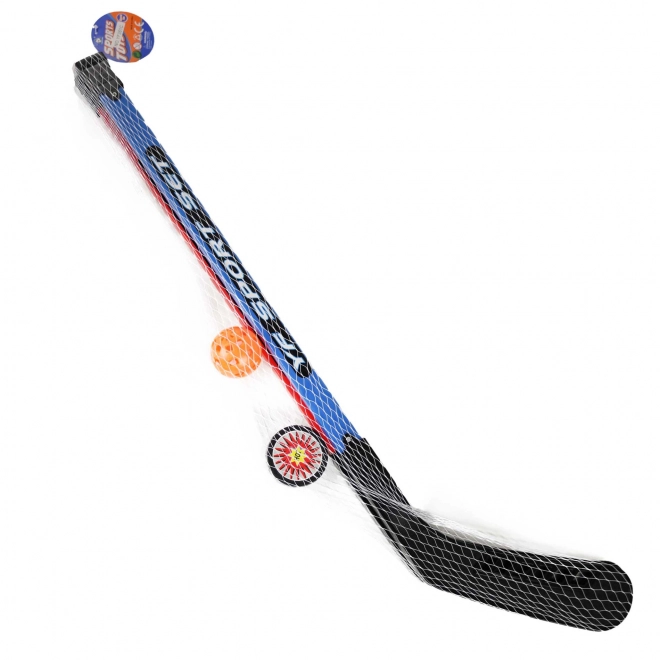 Hockeysticks met bal en puck