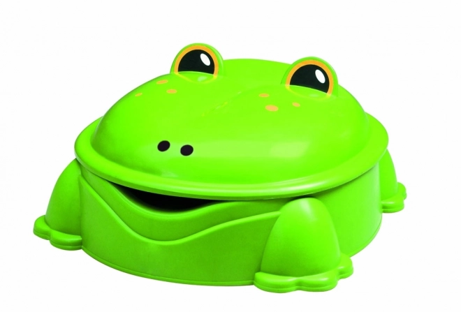 Plastic zandbak in de vorm van een kikker met groen deksel