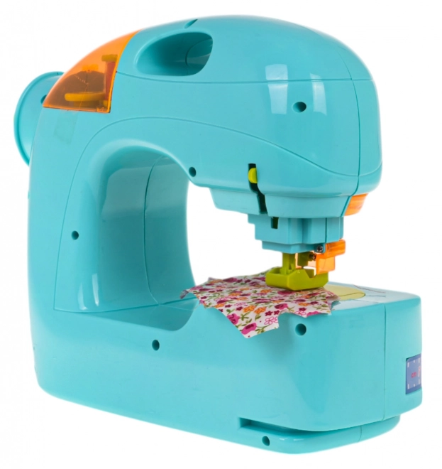 Blauwe naaimachine + accessoires