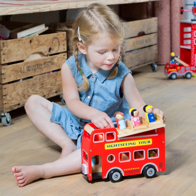Rode stadsbus met figuren