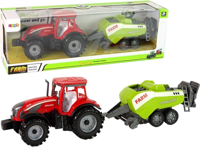 Rode tractor met groene zaaimachine met wrijvingsaandrijving
