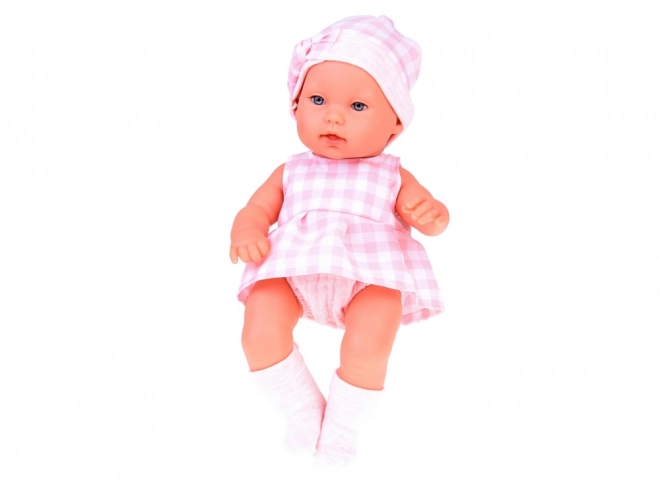 Stoffen paspop pasgeborene met roze muts