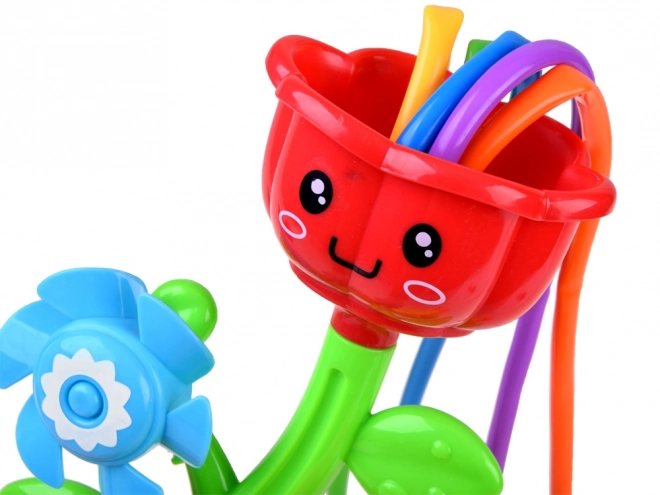 Fröhlicher Blumen-Kinderwasser-Sprinkler