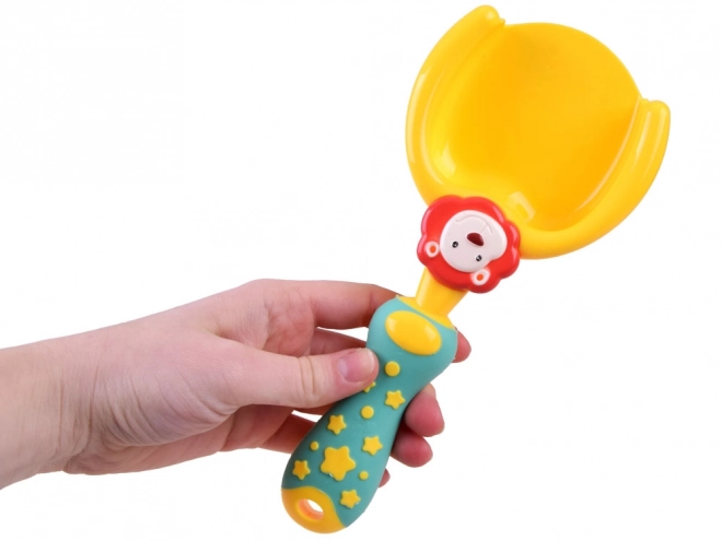 Kleurrijke zandset met emmer en vormpjes