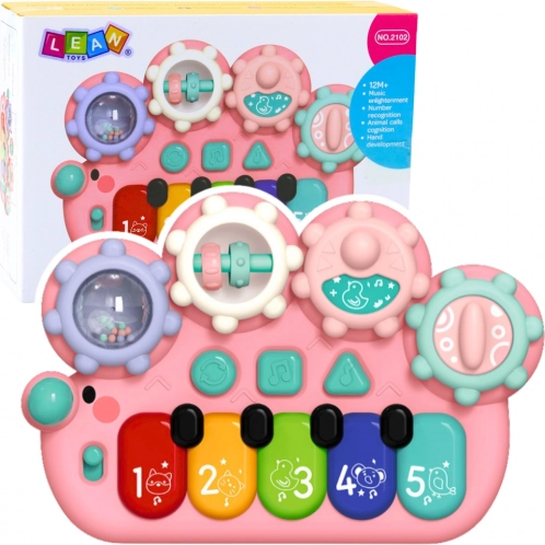 Interactief roze pianootje voor kinderen met tandwielen