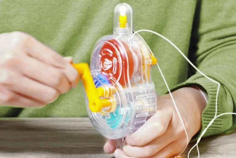 Handgenerator met kruk