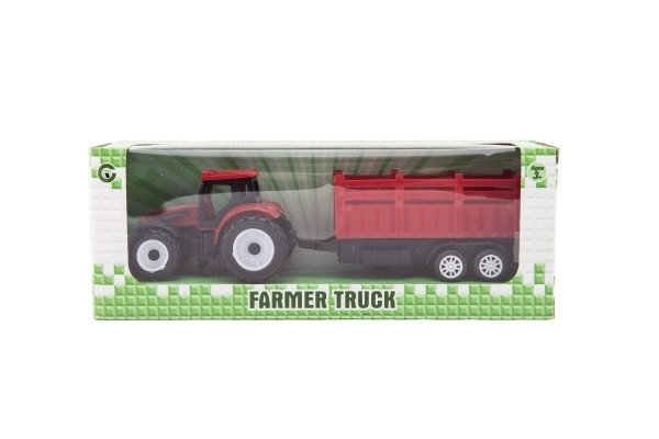 Tractor met aanhanger van plastic 21cm vrij lopend 2 kleuren in doosje 23x9x6cm