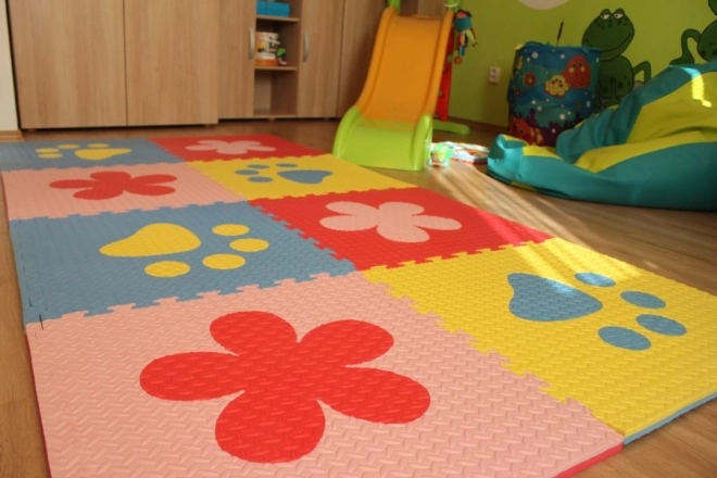Foam children's rug with blue and yellow paw prints