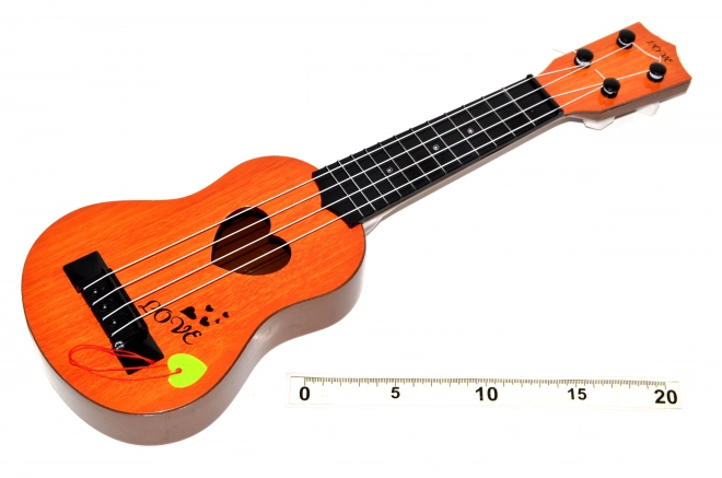 Gitaar met plectrum 43 cm