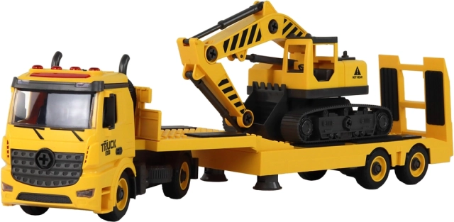 Takelwagen met graafmachine klaar voor het werk