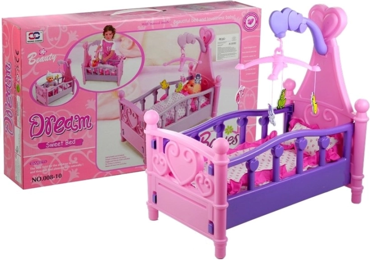 Großes Puppenbett mit Mobile und Bettwäsche
