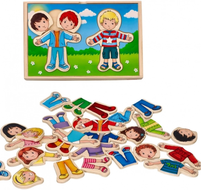 Houten puzzel voor kinderen Kleden met jongen en meisje