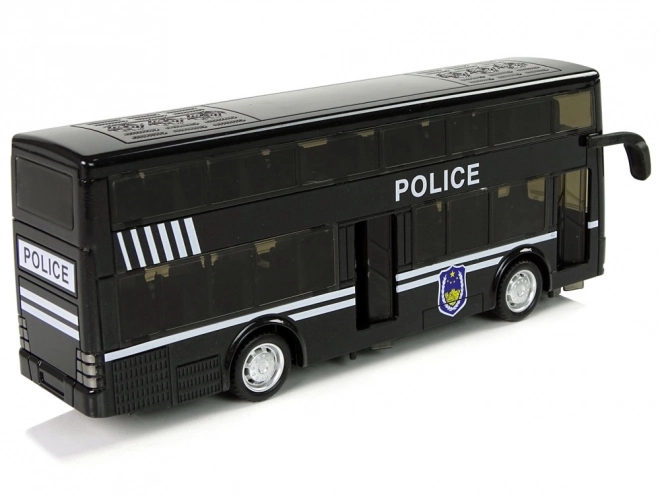 Autobus noir à deux étages de police avec propulsion par friction