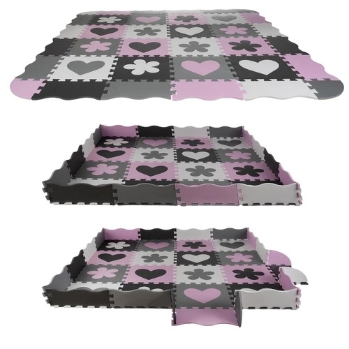 Contrasterende roze schuimpuzzel met hartjes en bloemetjes