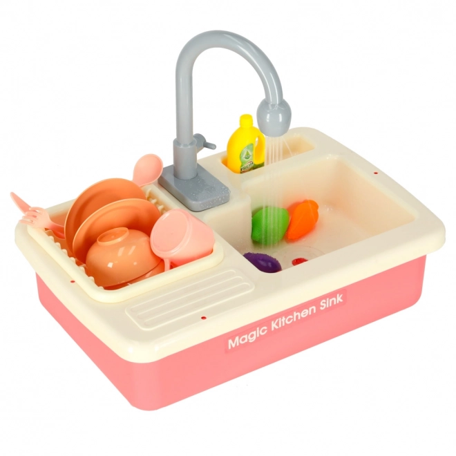 Kinderkeuken gootsteen met echt water en roze accessoires
