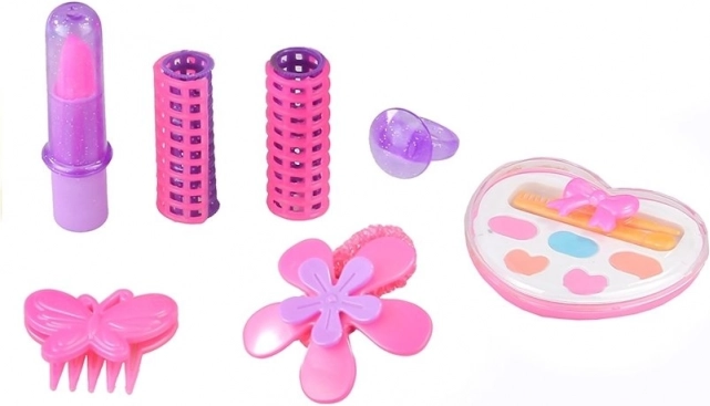 Makeup accessories and curlers for creative play