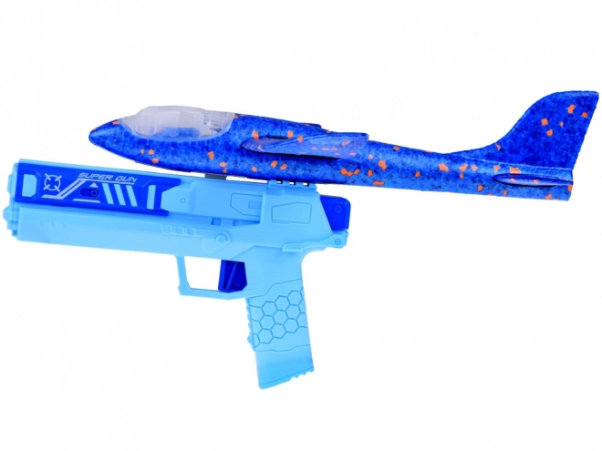 Avion en mousse avec lumière LED lancé depuis un pistolet