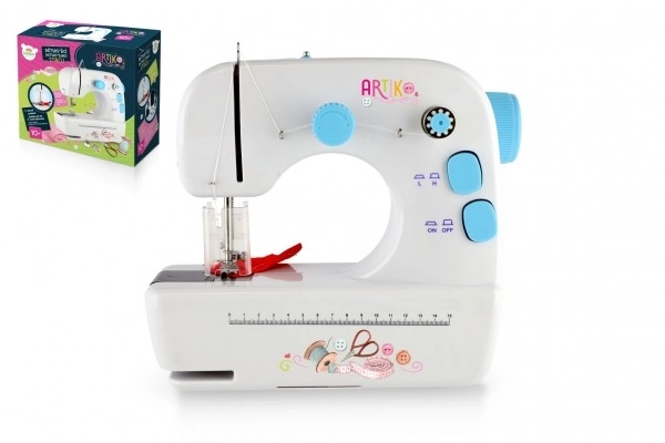 Naaimachine plastic/metaal 25cm op batterijen met licht en geluid in doos 30x26x13cm