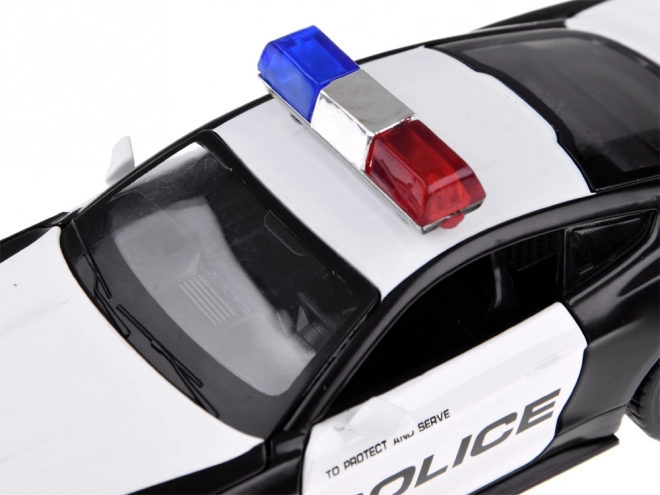 Metalen politieauto Ford Shelby GT350 op schaal 1:32 met zwaailichteffecten