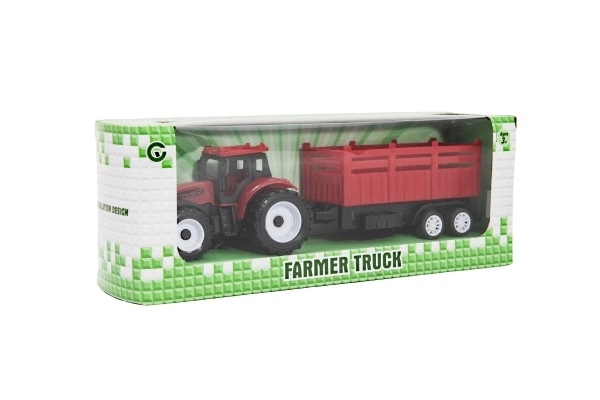 Tractor met aanhanger van plastic 21cm vrij lopend 2 kleuren in doosje 23x9x6cm
