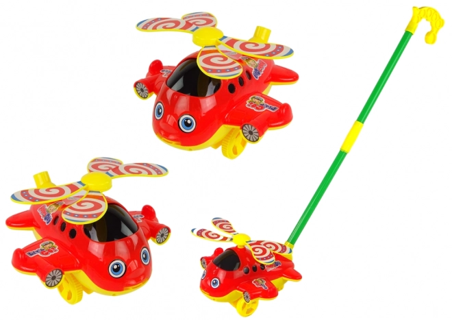 Fröhlicher Spielzeughubschrauber mit Stange