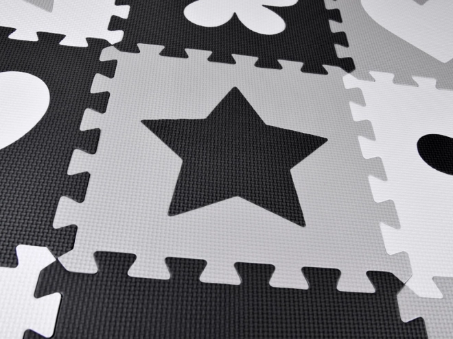 Contrasterende schuim puzzelmat met vormen