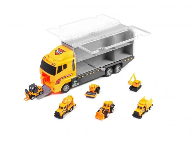 Camion avec petits véhicules de construction