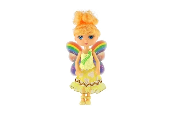 Pop fee met vleugels plastic 15cm 4 kleuren op kaart