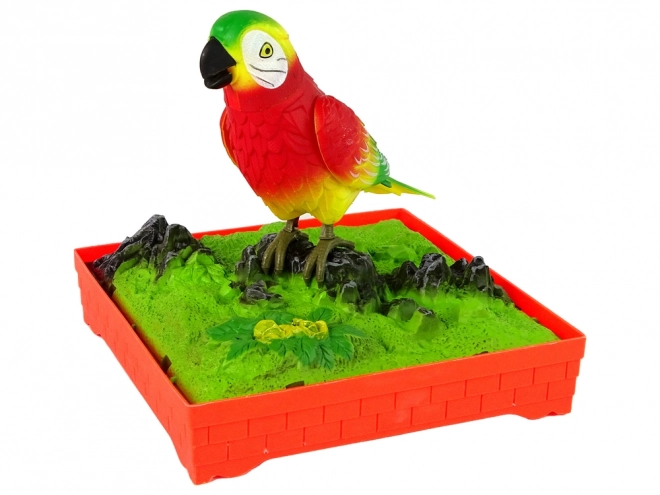 Zingende kleurrijke papegaai met kooi